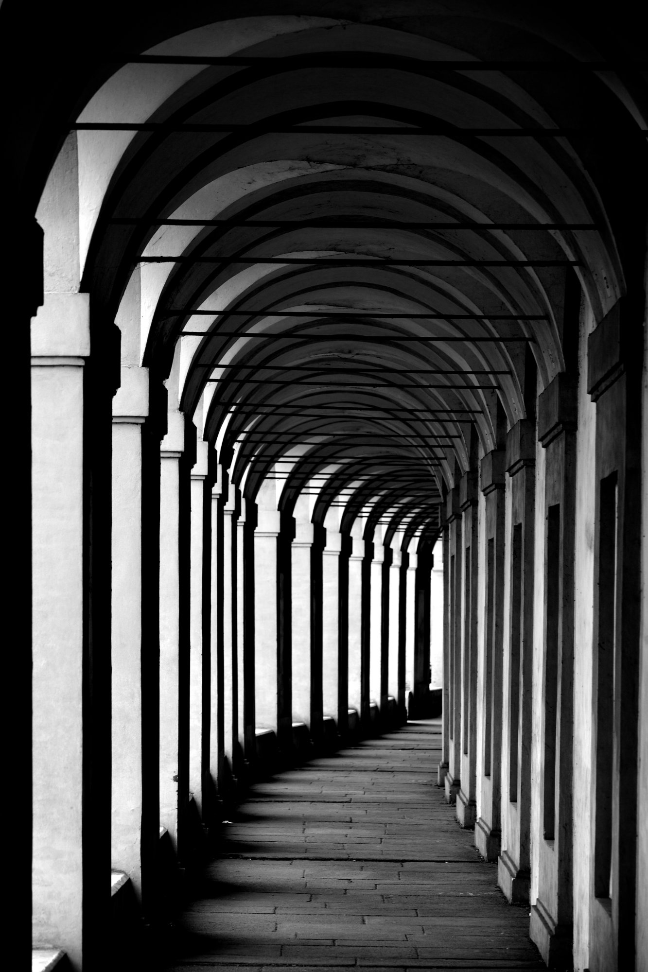 Arched colonnade receding in perspective